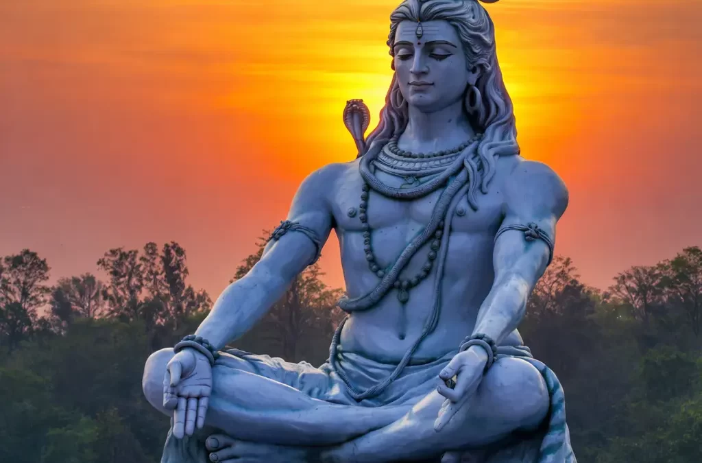 Meditating Lord Shiva statue seated in Padmasana on a tiger skin pedestal, with a glowing orange sunset sky in the background, symbolizing peace, spirituality, and divine power.